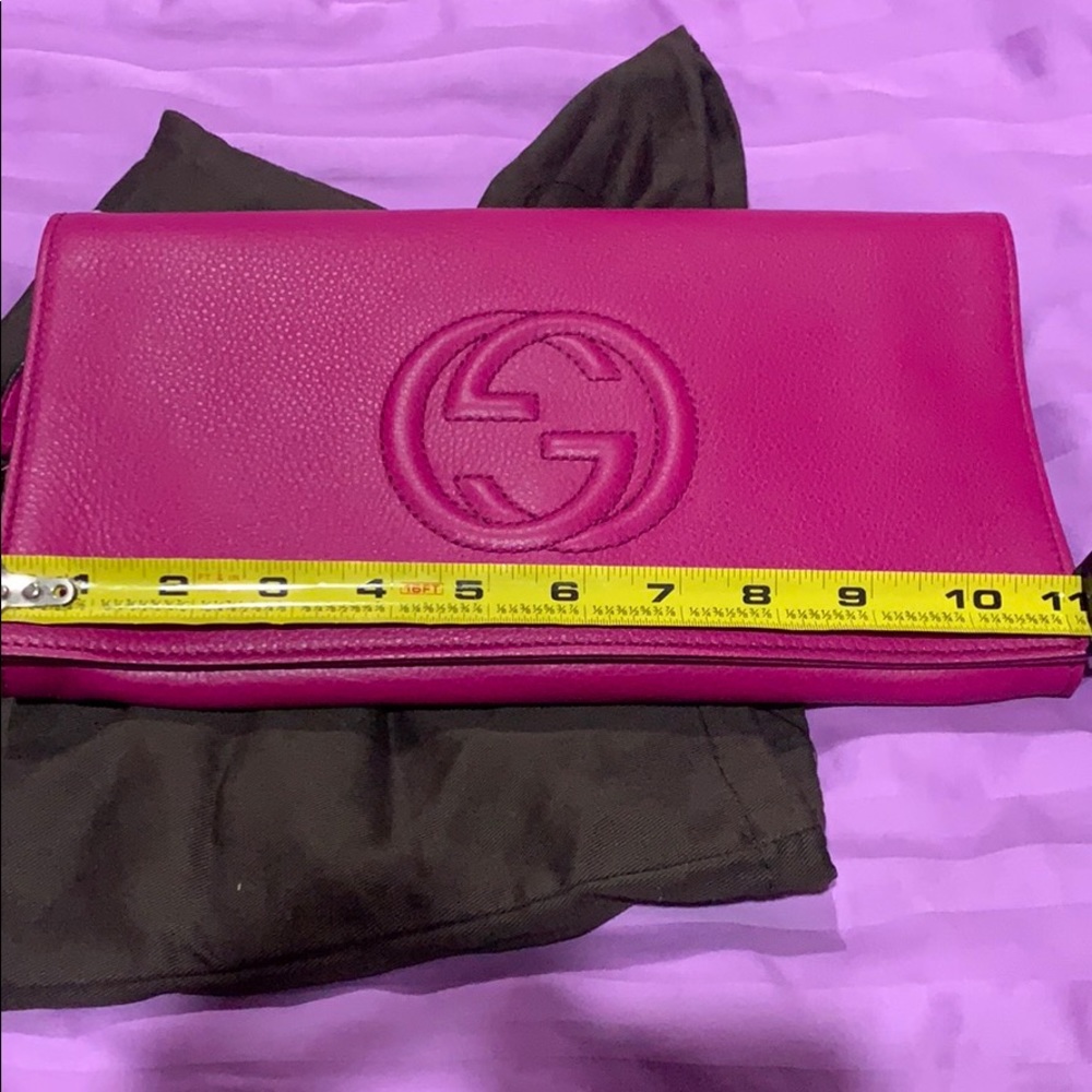 Brand new Gucci clutch in pink magenta